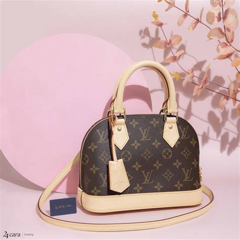 Alma BB Monogram Canvas .